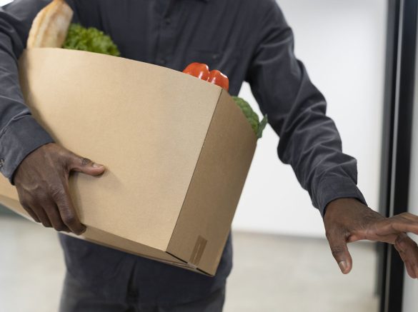 front-view-man-carrying-groceries-box